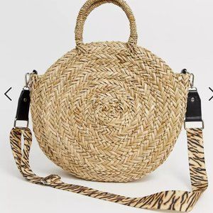 Straw bag with tiger stripe strap